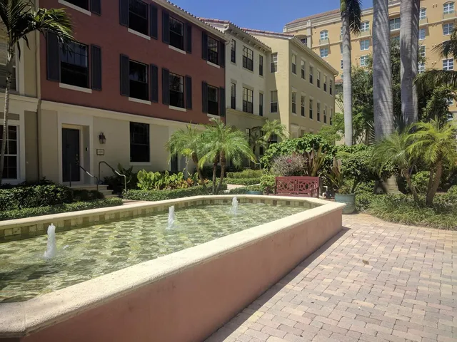 a view of a street with cars