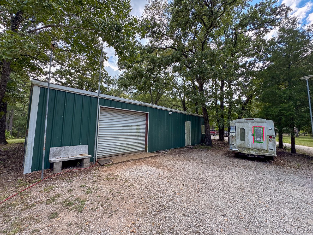 450 Four Notch Road Huntsville, TX 77340 - Photo 36 of 49 a car parked in front of house