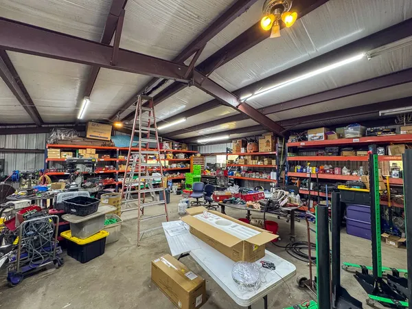 a view of a storage room with racks