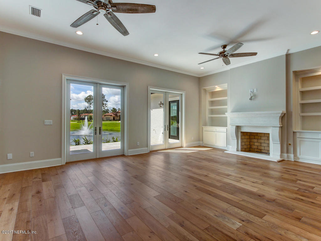 5239 Bentpine Cove Road Jacksonville, FL 32224 - Photo 20 of 83 FAMILY ROOM WITH VIEW OF LAKE & FOUNTAIN