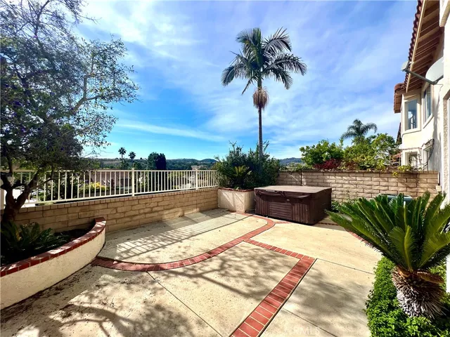 a view of a backyard with a patio