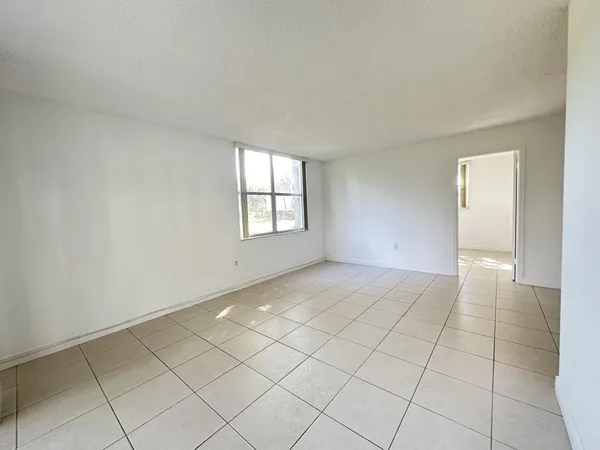 $159,000 | 9401 Lime Bay Boulevard, Unit 115, Tamarac, FL 33321