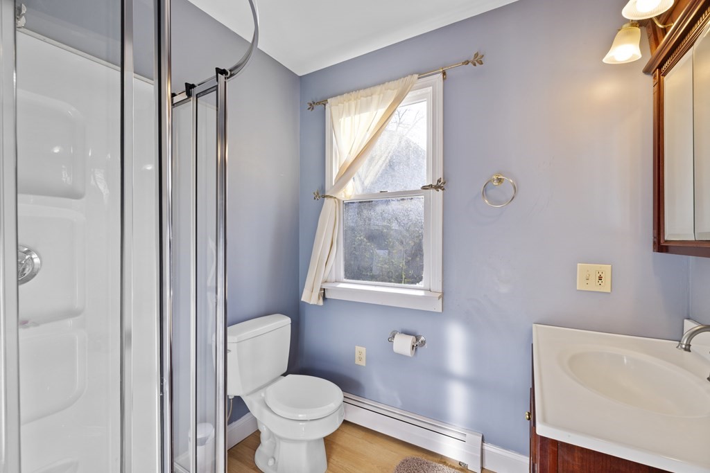 4 Bennett Road Marblehead, MA 01945 - Photo 12 of 19 a bathroom with a sink toilet and shower