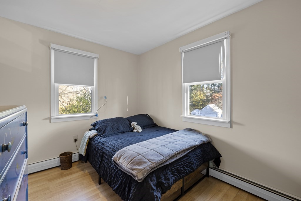 4 Bennett Road Marblehead, MA 01945 - Photo 14 of 19 a bedroom with a bed and window