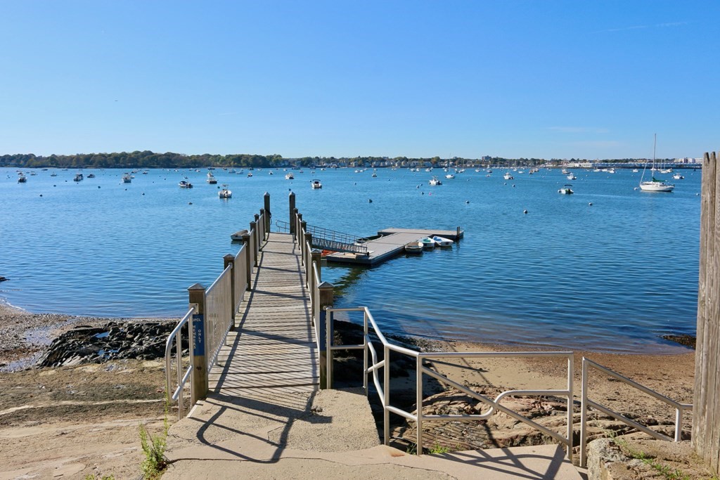 4 Bennett Road Marblehead, MA 01945 - Photo 18 of 19 a view of a terrace with wooden floor and cabinet
