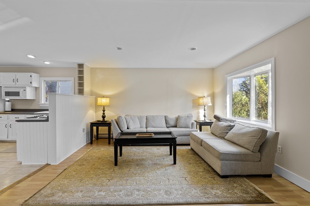 4 Bennett Road Marblehead, MA 01945 - Photo 4 of 19 a living room with furniture and a table