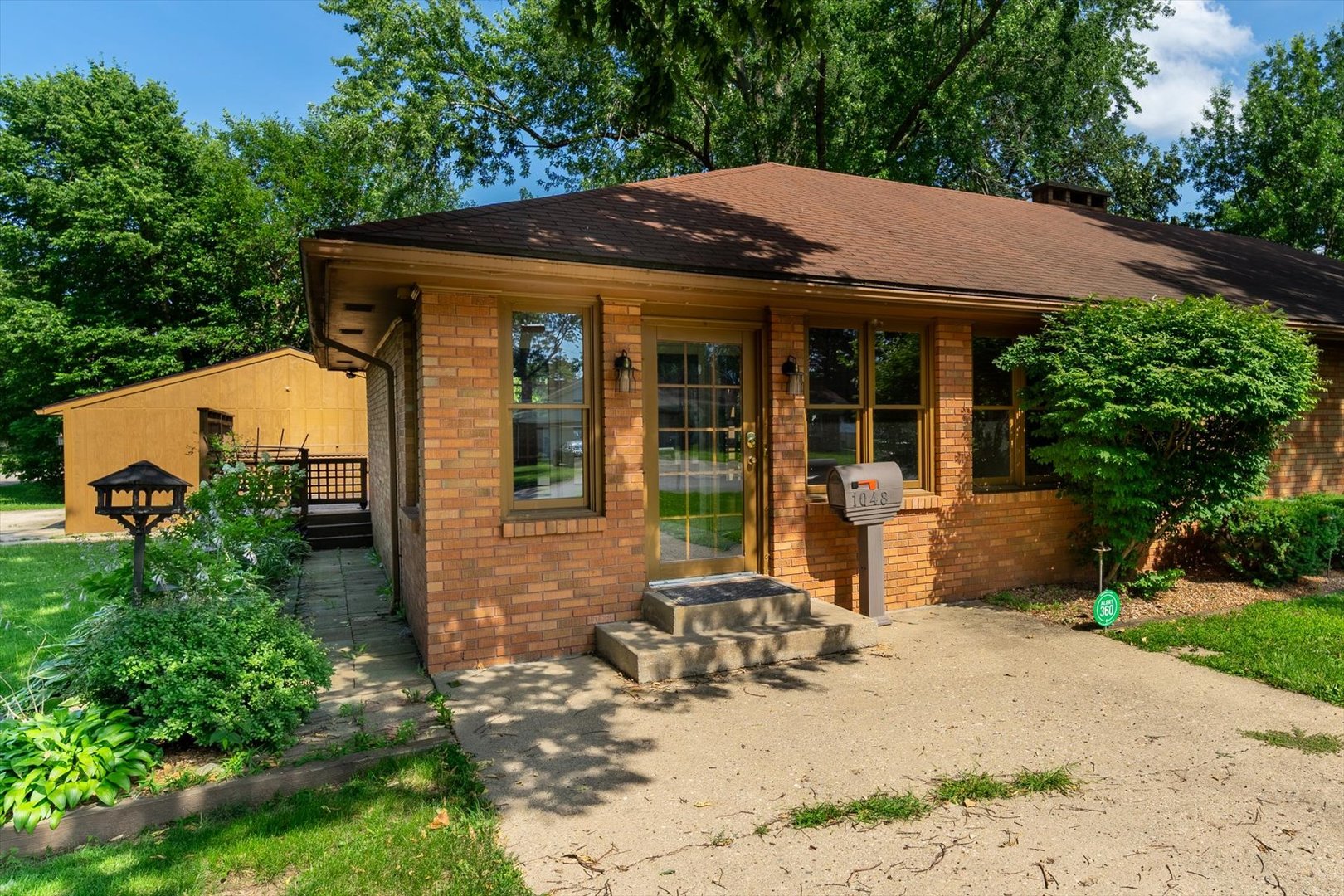 1048 Warren Street Henry, IL 61537 - Photo 8 of 34 a view of a house with outdoor seating area