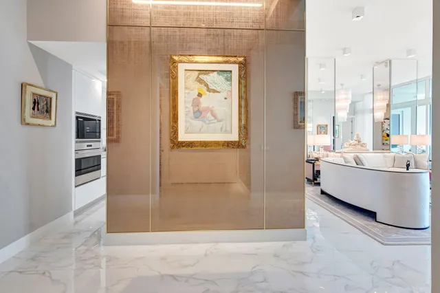 a bathroom with a sink toilet vanity and shower