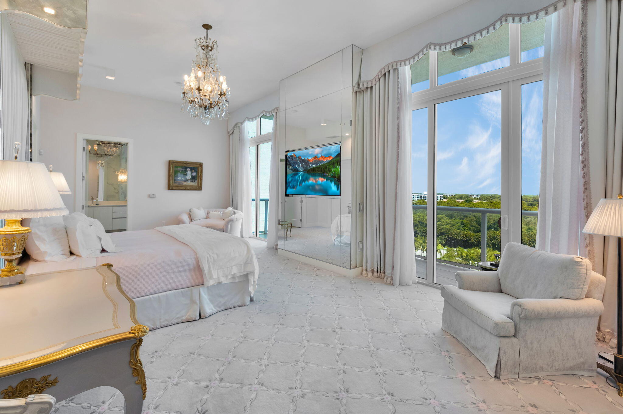 20155 Boca W Drive, Unit PHC902 Boca Raton, FL 33434 - Photo 16 of 56 a spacious bedroom with a bed couch and a large window