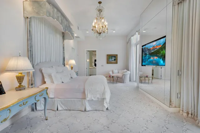 a bathroom with a double vanity sink mirror and shower