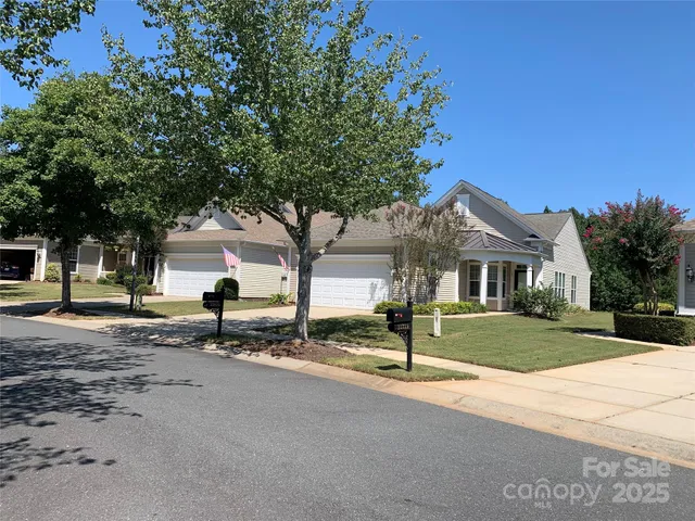 a house with a tree in front of it