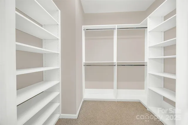 a view of an empty walk in closet