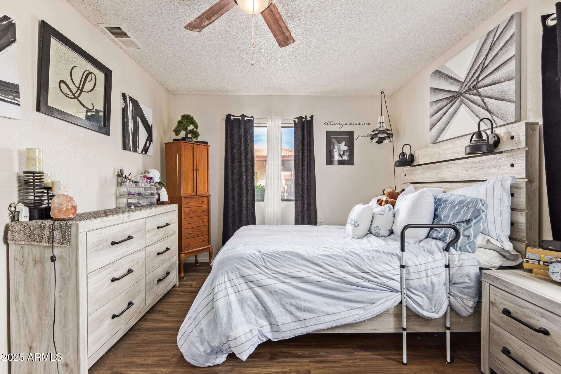 1440 North Idaho Road, Unit 1081 Apache Junction, AZ 85119 - Photo 17 of 33 a bedroom with a bed and a dresser