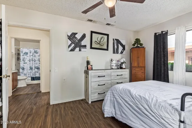 a bedroom with a bed and a walk in closet