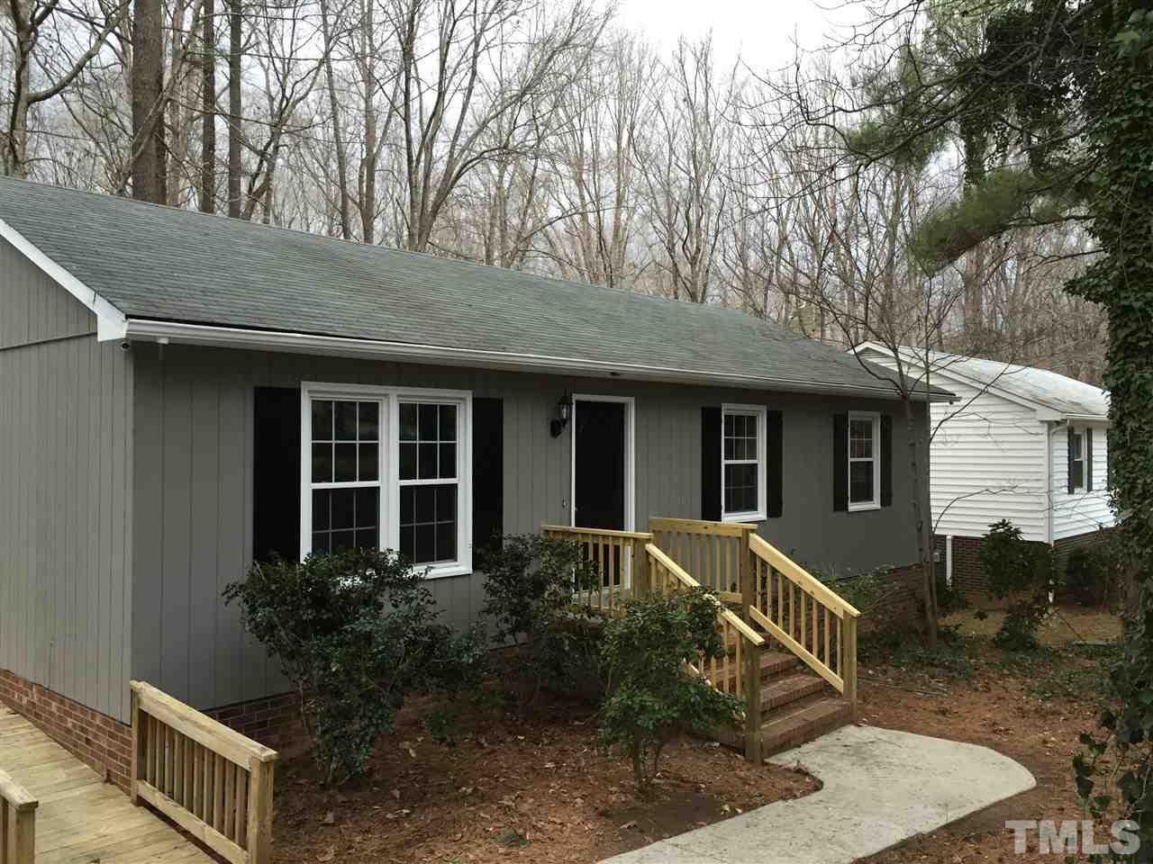 7405 Post Oak Road Raleigh, NC 27615 - Photo 1 of 24 Freshly painted, new front door, new railing.