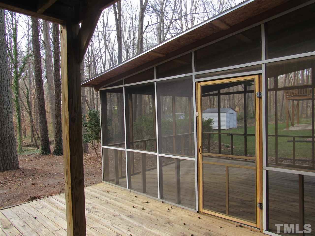 7405 Post Oak Road Raleigh, NC 27615 - Photo 15 of 24 Screened in porch has a brand new roof, new screen and a new door!