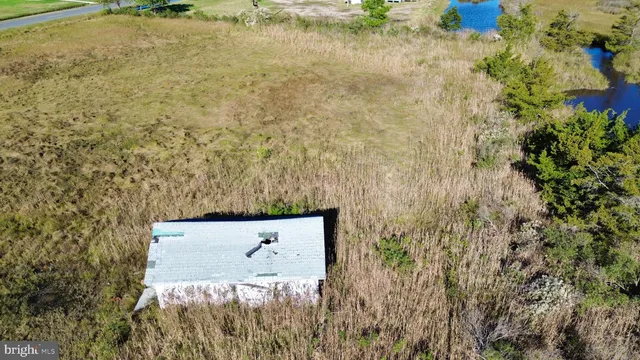 a close view of water heater with wooden floor