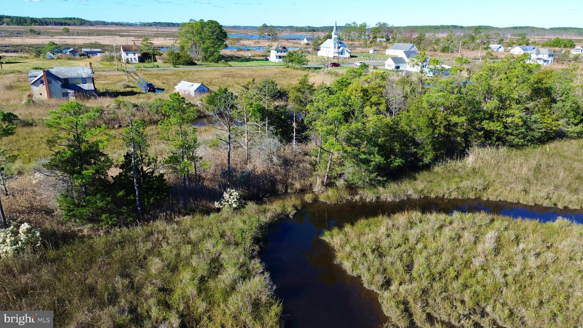 2726 Toddville Road Toddville, MD 21672 - Photo 7 of 14 a view of a lake with a city