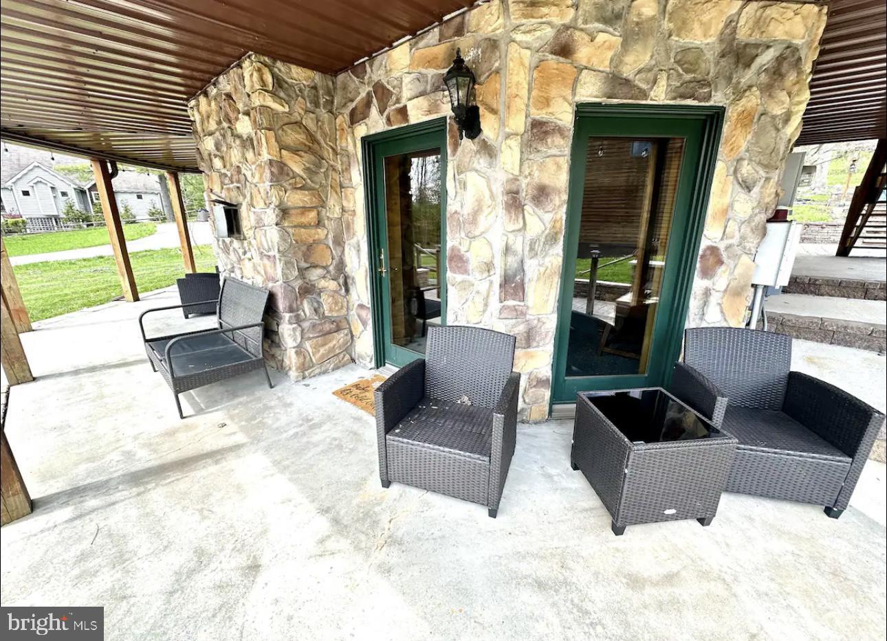 229 Rock Lodge Road McHenry, MD 21541 - Photo 11 of 16 Charming stone patio retreat.