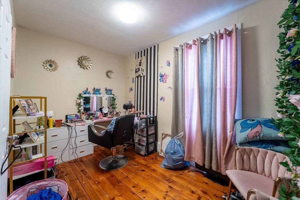 78 Gage Street Worcester, MA 01604 - Photo 11 of 25 a view of a workspace with furniture and toys