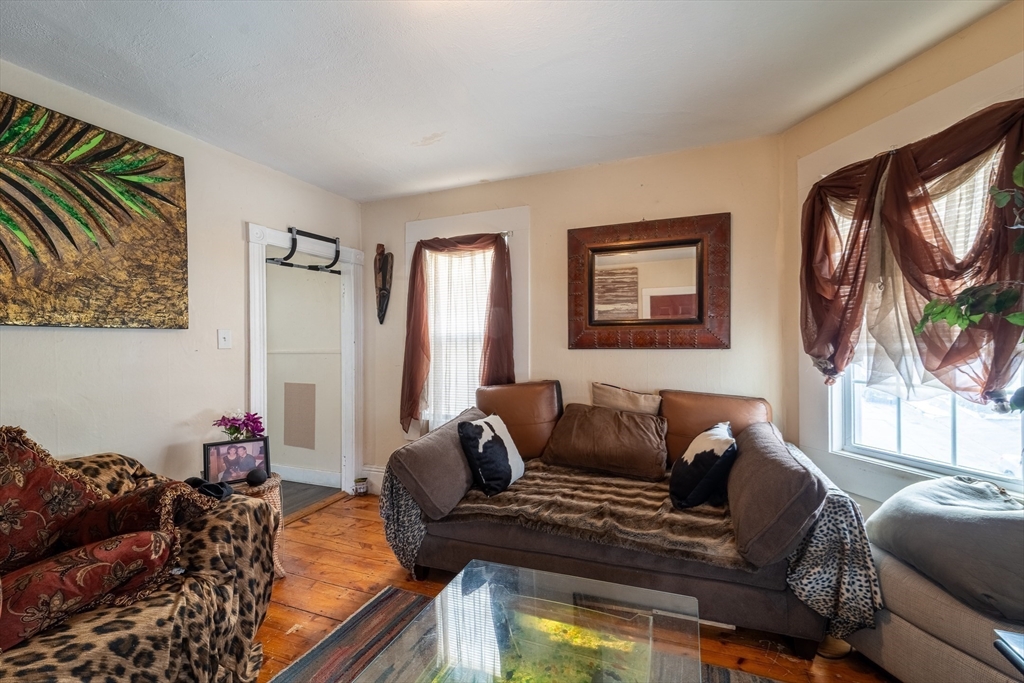 78 Gage Street Worcester, MA 01604 - Photo 18 of 25 a living room with furniture and a window