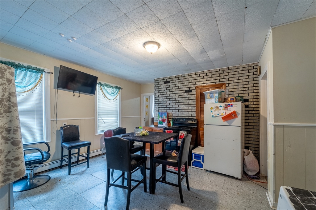 78 Gage Street Worcester, MA 01604 - Photo 23 of 25 a dining room with furniture and window