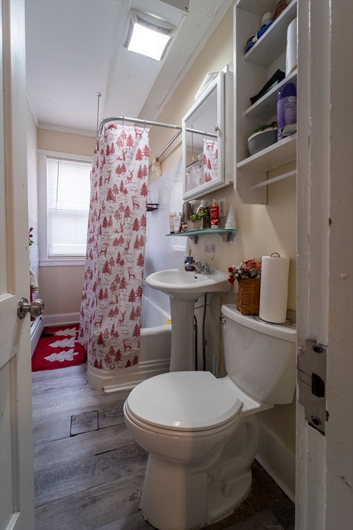 78 Gage Street Worcester, MA 01604 - Photo 25 of 25 a bathroom with a toilet and a shower curtain