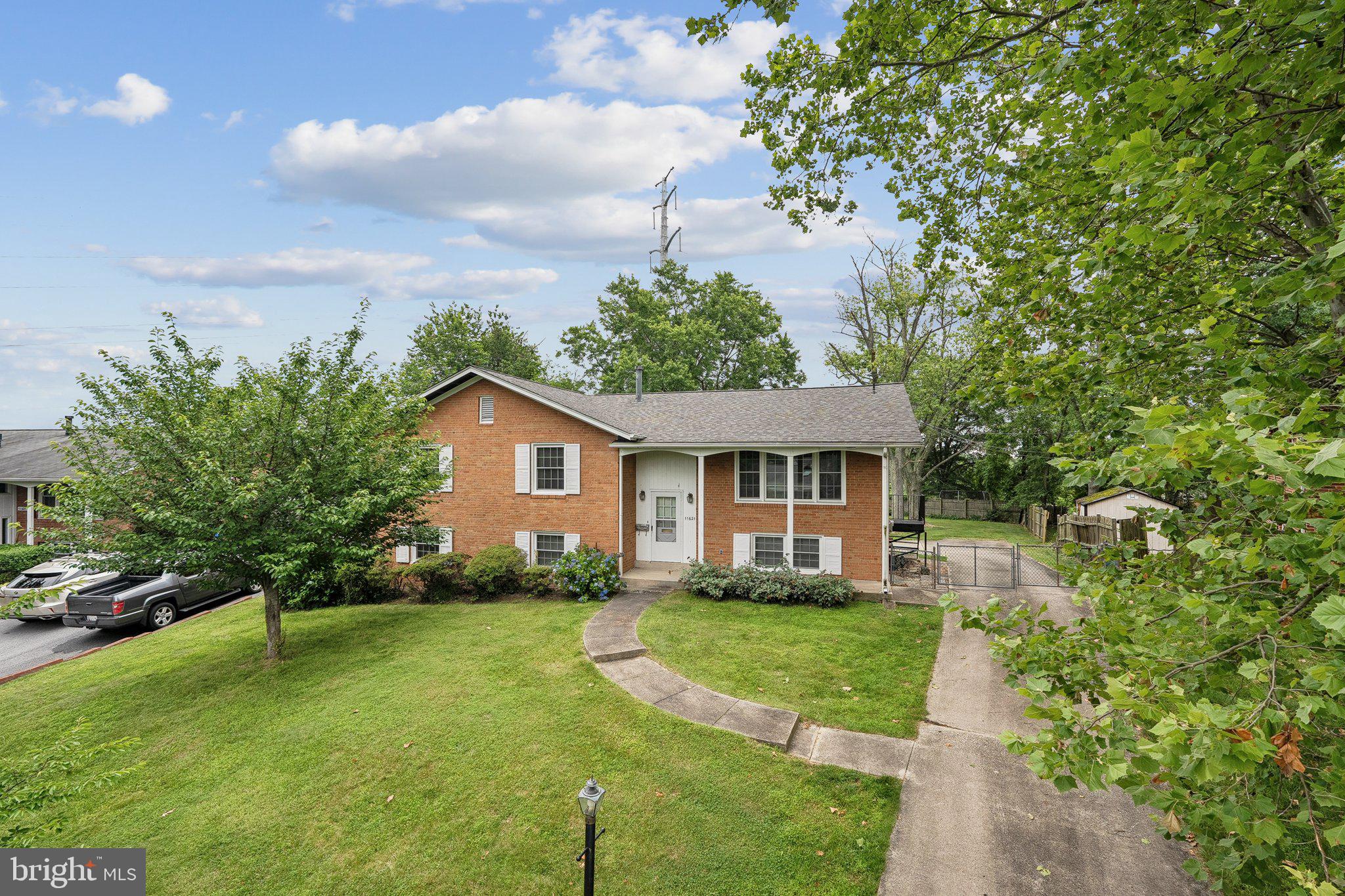a house view with a garden space