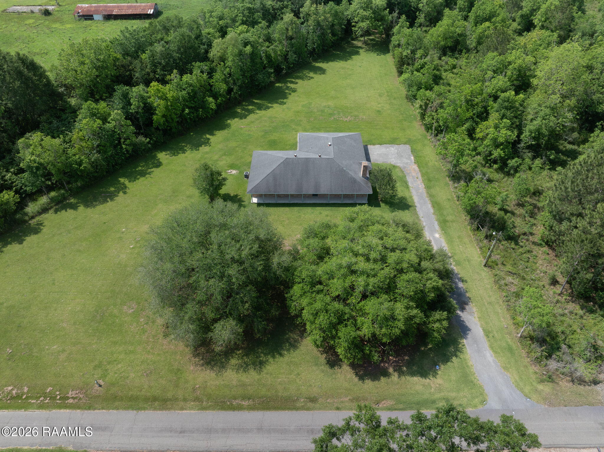 292 Curtis Brown Road Opelousas, LA 70570 - Photo 5 of 30 28-web-or-mls-DJI_20260428235434_0431_D