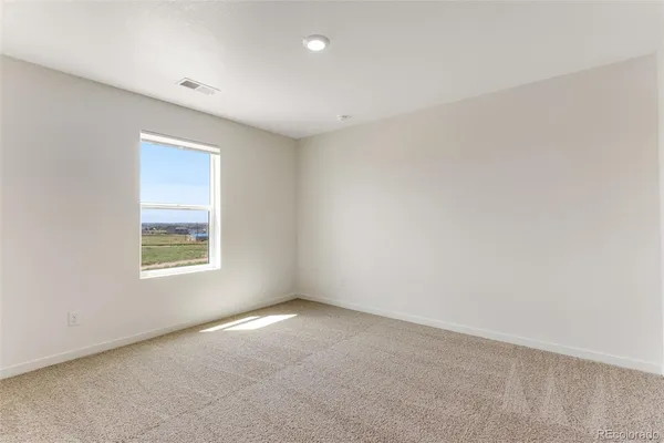 an empty room with a window