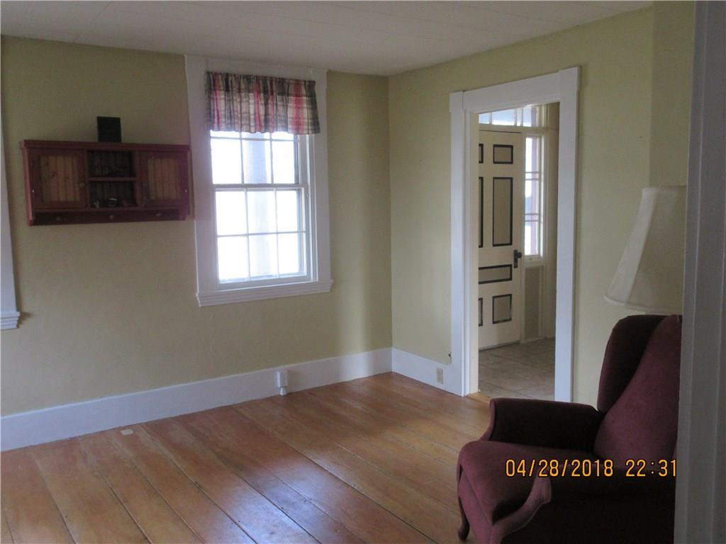 6 Maple Street Hallowell, ME 04347 - Photo 12 of 27 Living room. Door to front entry way.