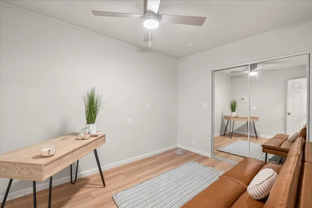 a workspace with furniture and wooden floor