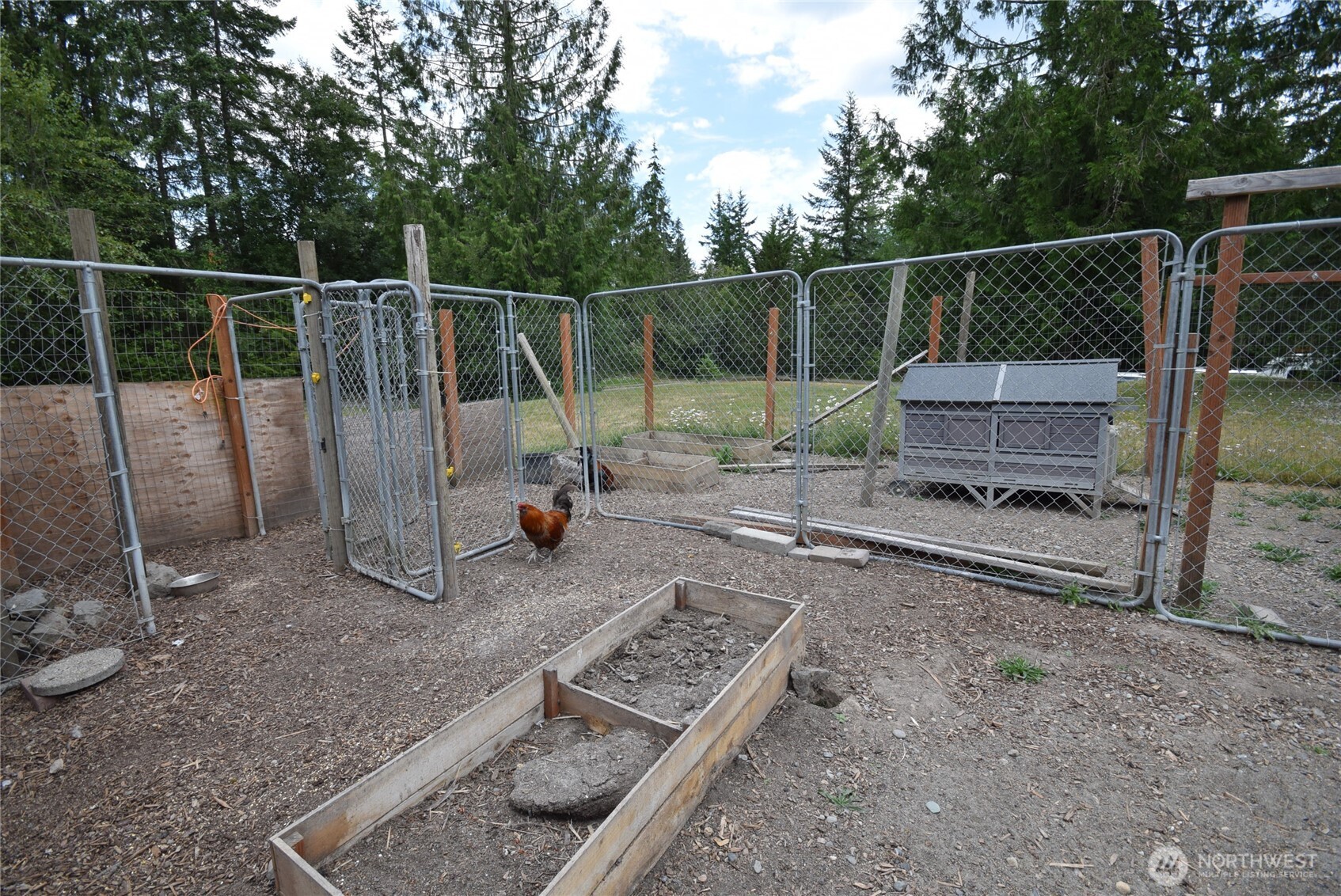 561 Country Acres Lane Sequim, WA 98382 - Photo 34 of 37 a view of a chair and fire pit