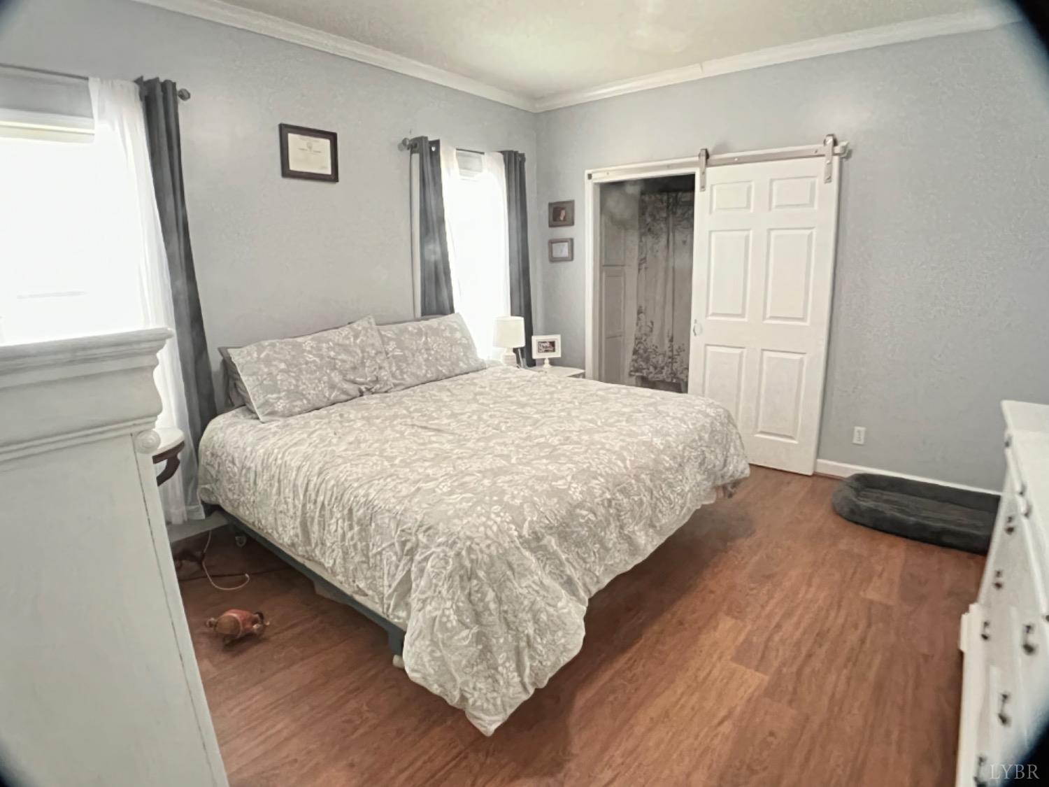 5396 Roark Mill Road Hurt, VA 24563 - Photo 13 of 25 a bedroom with a bed and a window