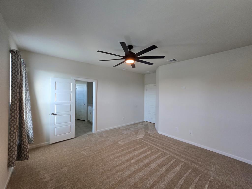 508 Williams Way Van Alstyne, TX 75495 - Photo 10 of 26 a view of an empty room and chandelier fan