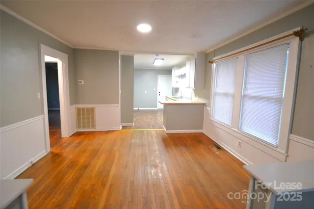 a view of an empty room and window