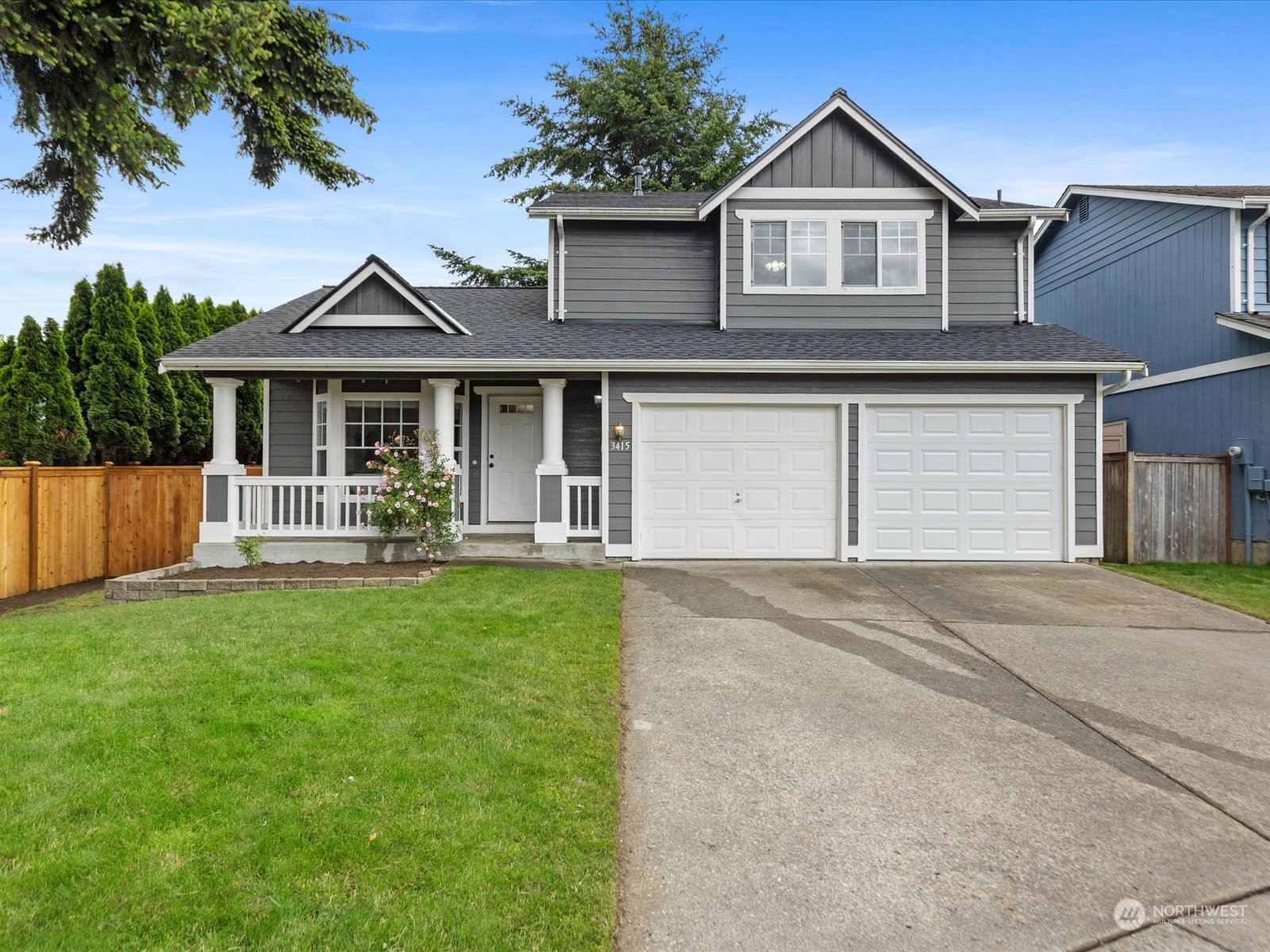3415 189th Street Southeast Bothell, WA 98012 - Photo 1 of 33 a front view of a house with yard