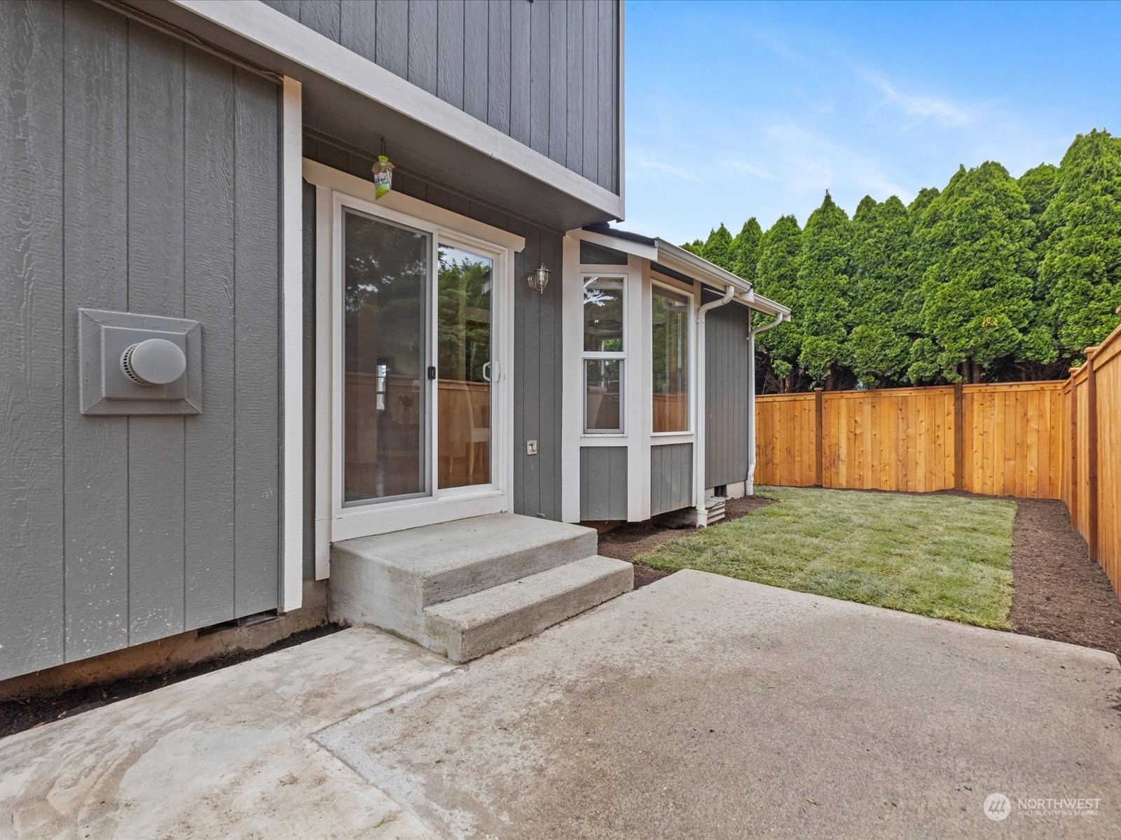 3415 189th Street Southeast Bothell, WA 98012 - Photo 27 of 33 a view of backyard with large trees and plants