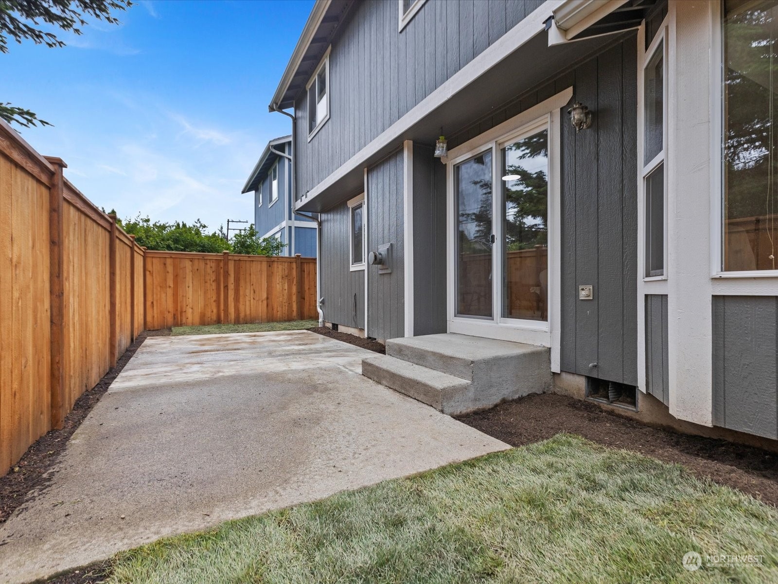 3415 189th Street Southeast Bothell, WA 98012 - Photo 28 of 33 a view of a house with backyard and door