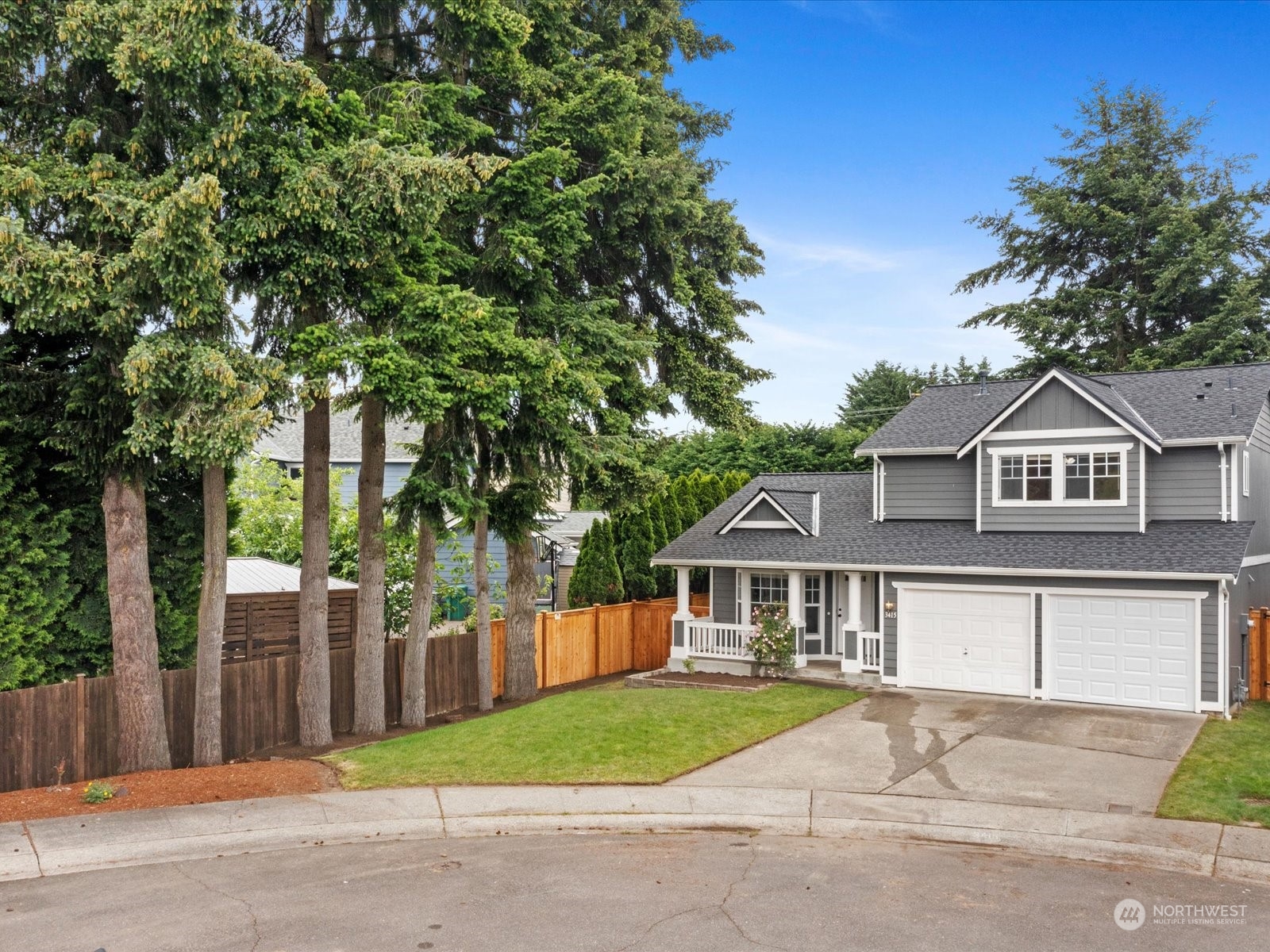 3415 189th Street Southeast Bothell, WA 98012 - Photo 30 of 33 a front view of a house with a garden