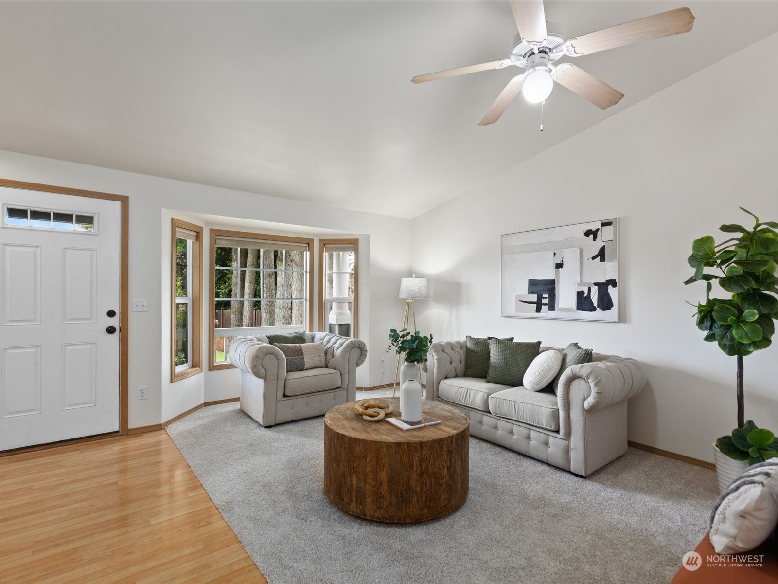 3415 189th Street Southeast Bothell, WA 98012 - Photo 6 of 33 a living room with furniture and a large window