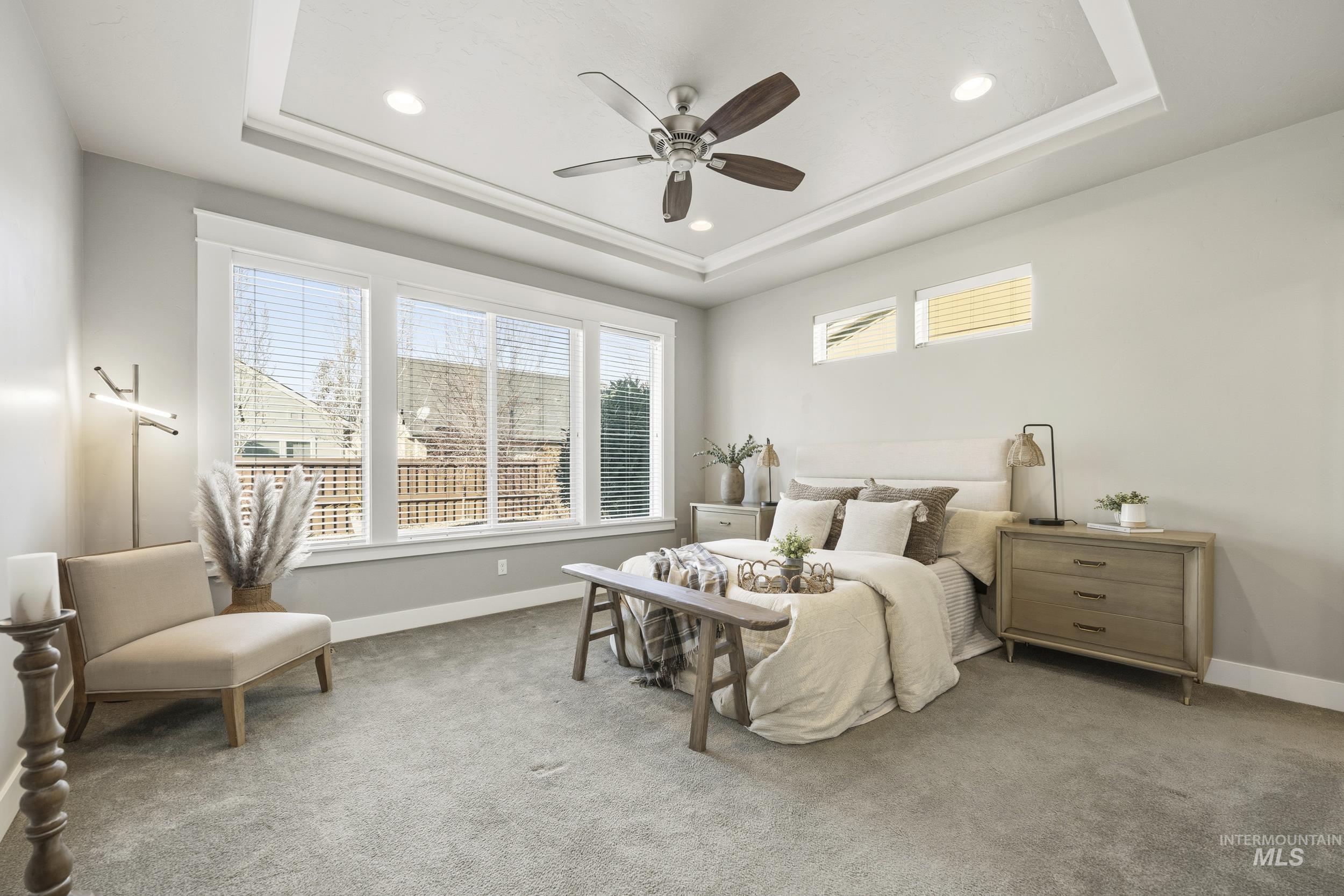 5699 North Fairborn Avenue Meridian, ID 83646 - Photo 16 of 30 Bedroom with carpet flooring, ceiling fan, recessed lighting, and a raised ceiling