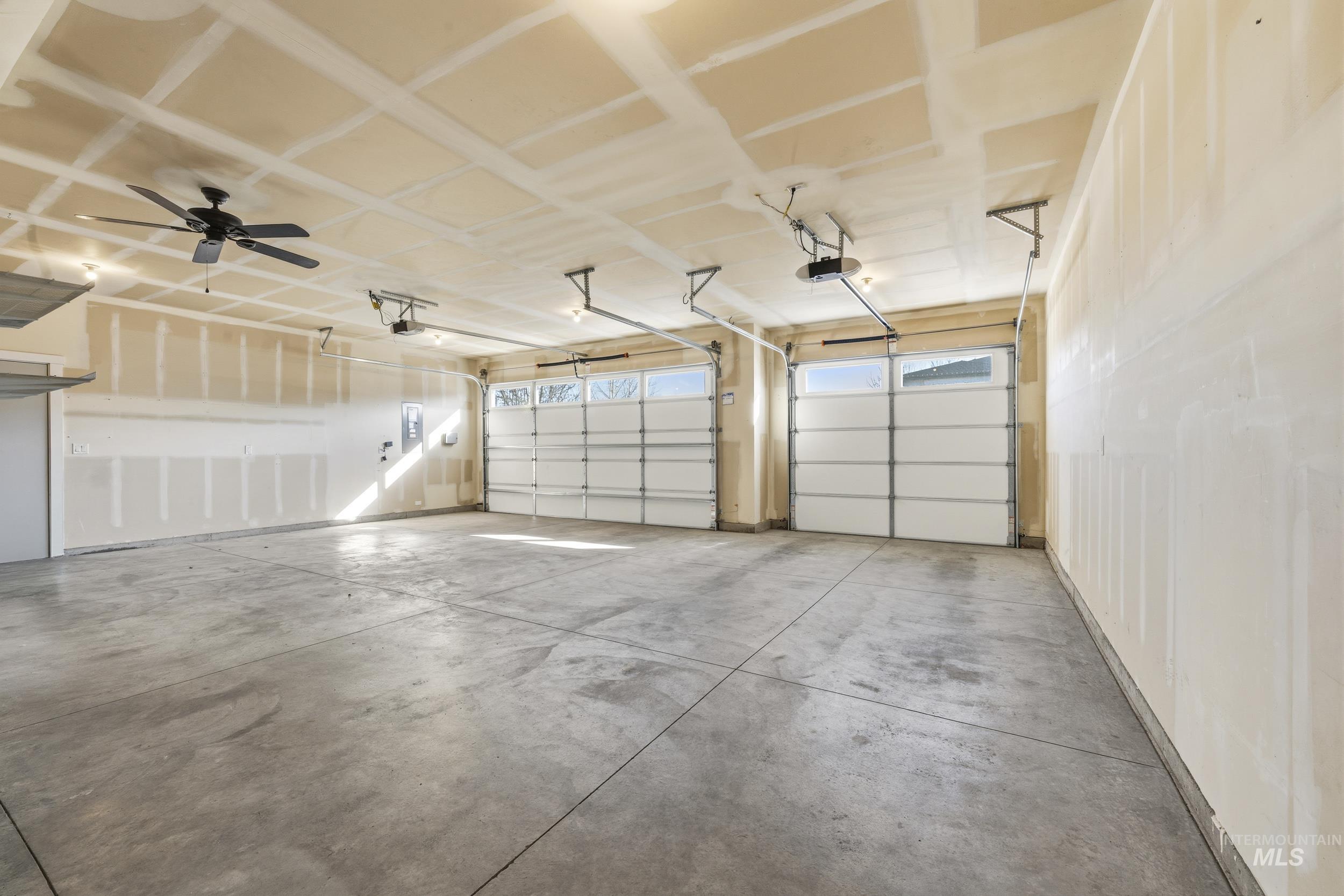 5699 North Fairborn Avenue Meridian, ID 83646 - Photo 22 of 30 Garage with a garage door opener