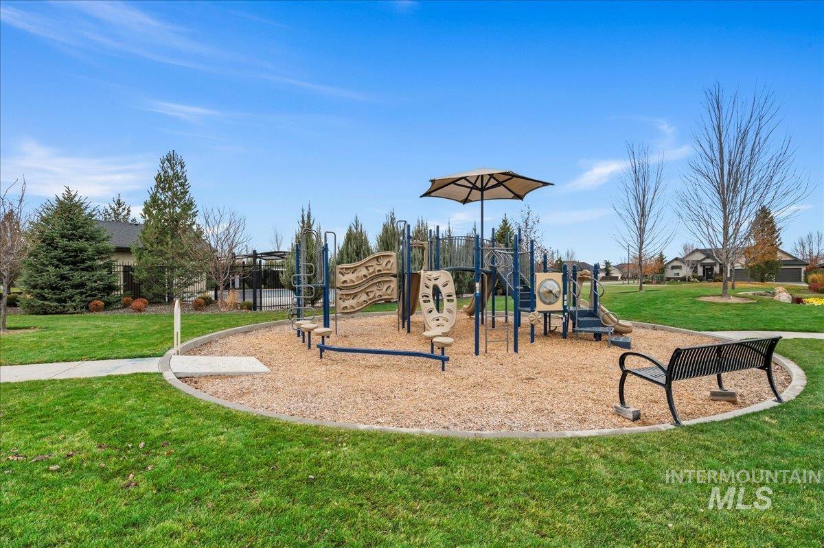5699 North Fairborn Avenue Meridian, ID 83646 - Photo 29 of 30 Community play area with a lawn