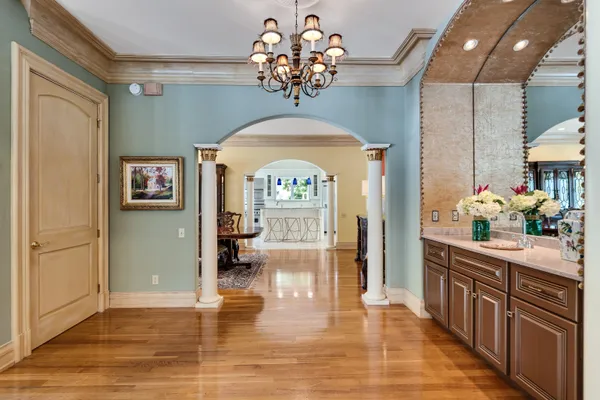 a kitchen with a stove a sink and a microwave