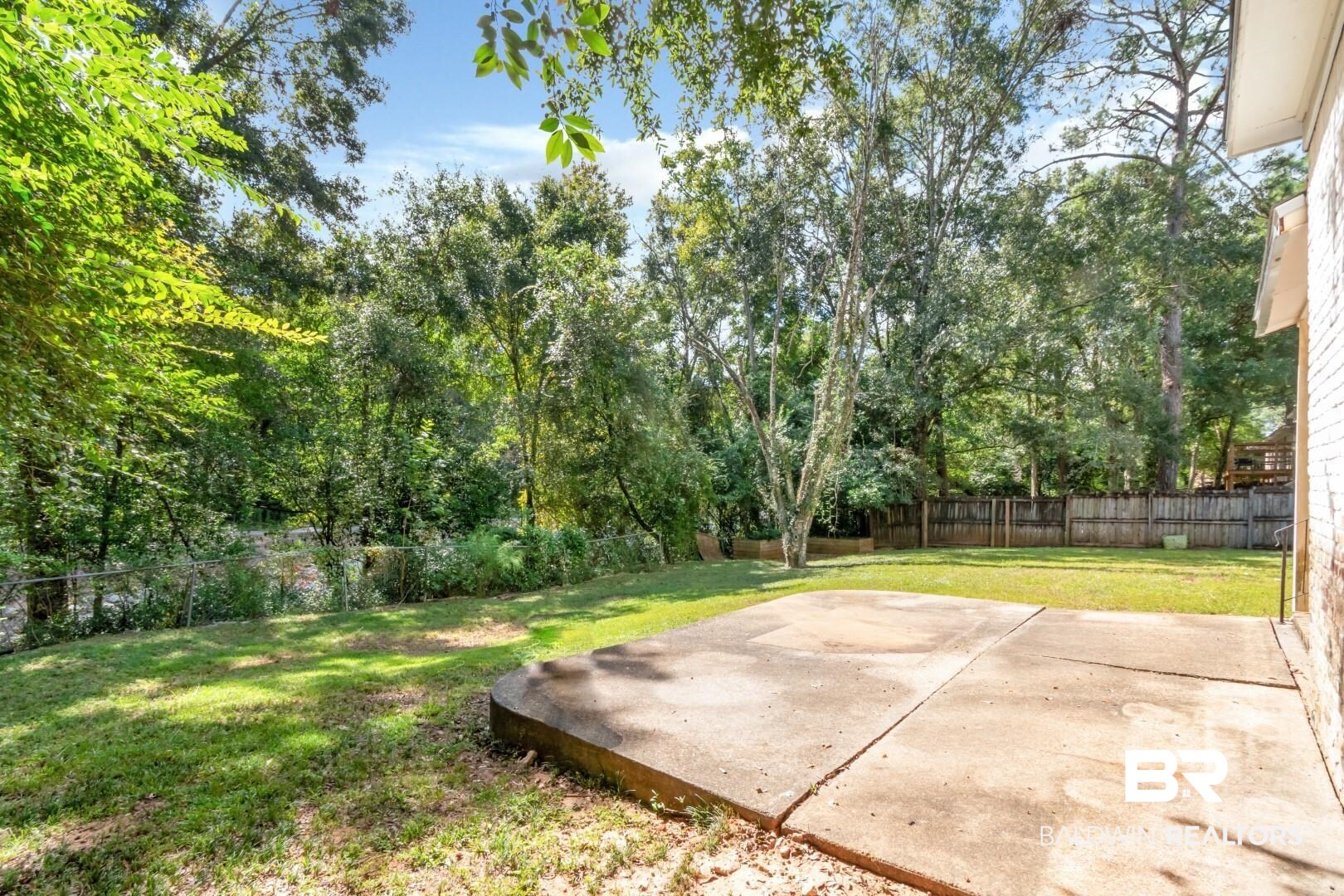 320 Vanderbilt Drive Mobile, AL 36608 - Photo 32 of 39 View of yard with a patio