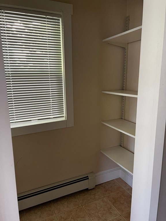 196 Boston Road Chelmsford, MA 01824 - Photo 6 of 26 a room that has a window in it