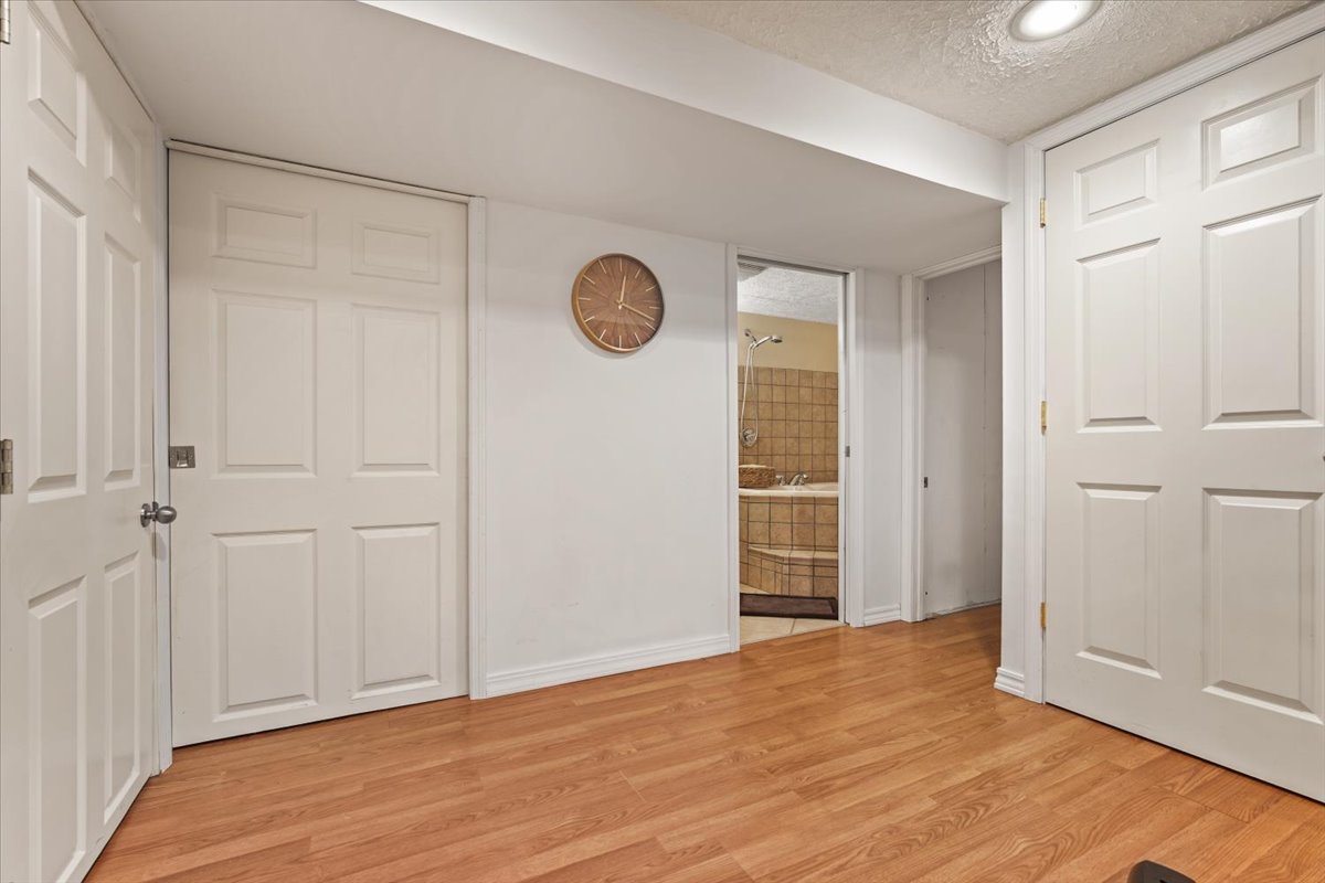 2 Yew Court Bloomington, IL 61701 - Photo 22 of 27 a view of empty room with wooden floor