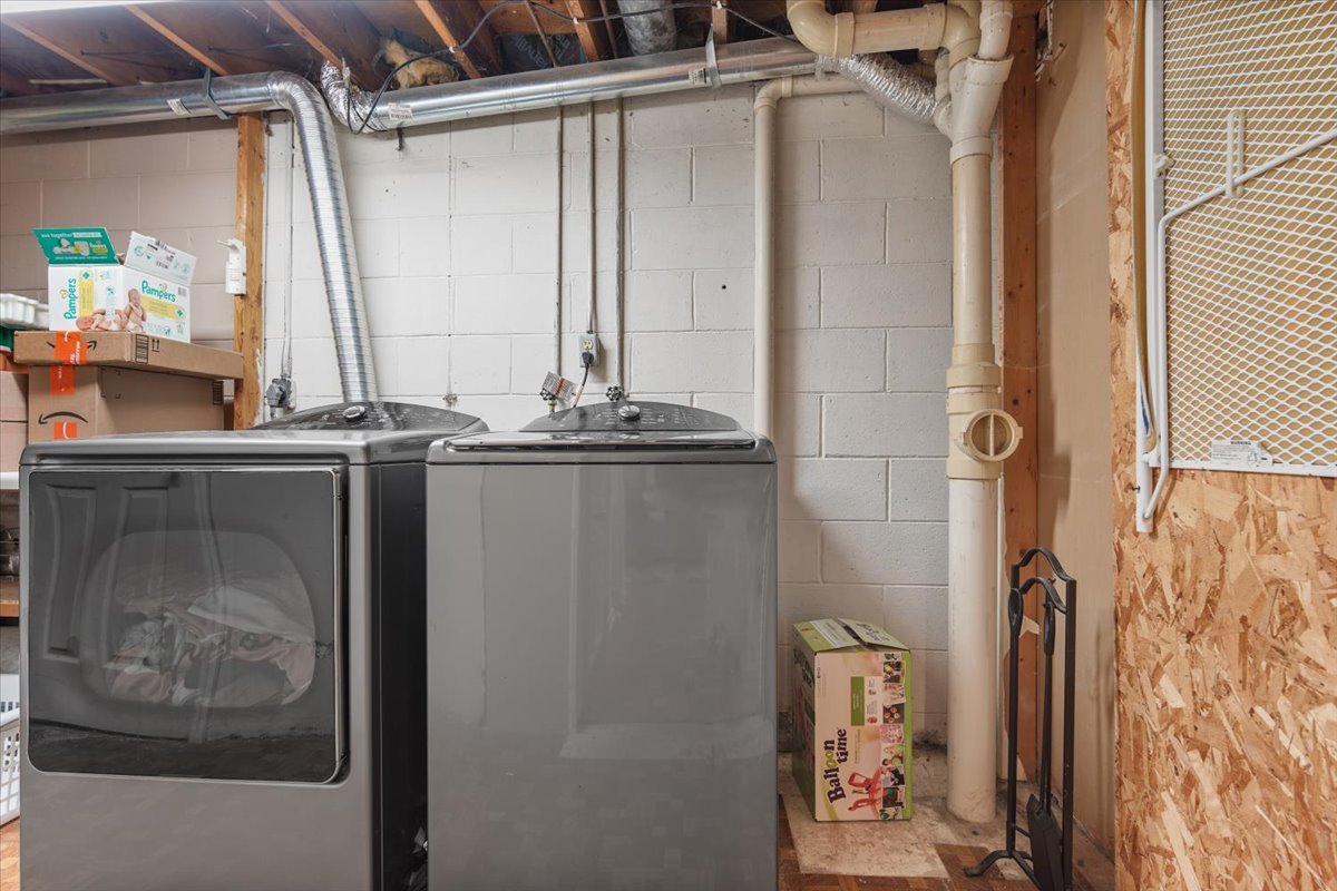 2 Yew Court Bloomington, IL 61701 - Photo 25 of 27 a bathroom with a granite countertop sink and a mirror