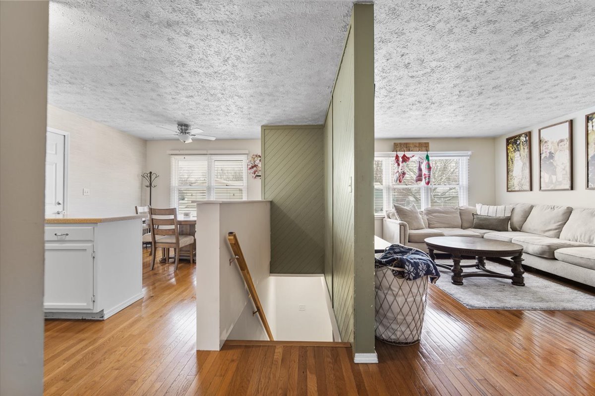 2 Yew Court Bloomington, IL 61701 - Photo 10 of 27 a living room with furniture and a wooden floor